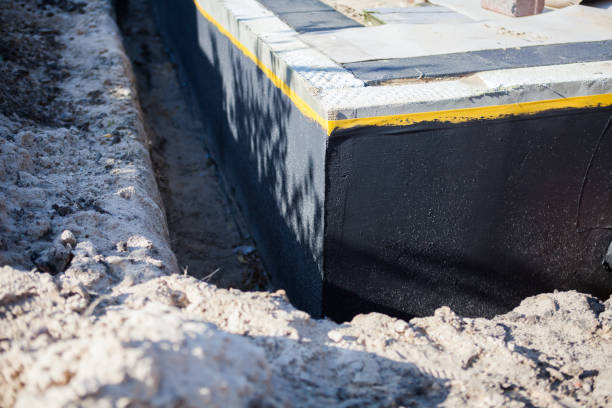 Professional Waterproofing technician working in Straughn, IN